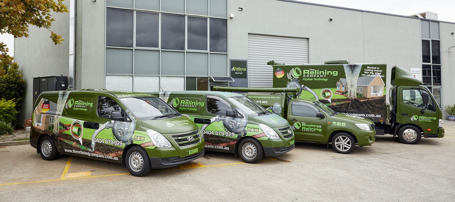 A small fleet of Relining Company Trucks and Vans